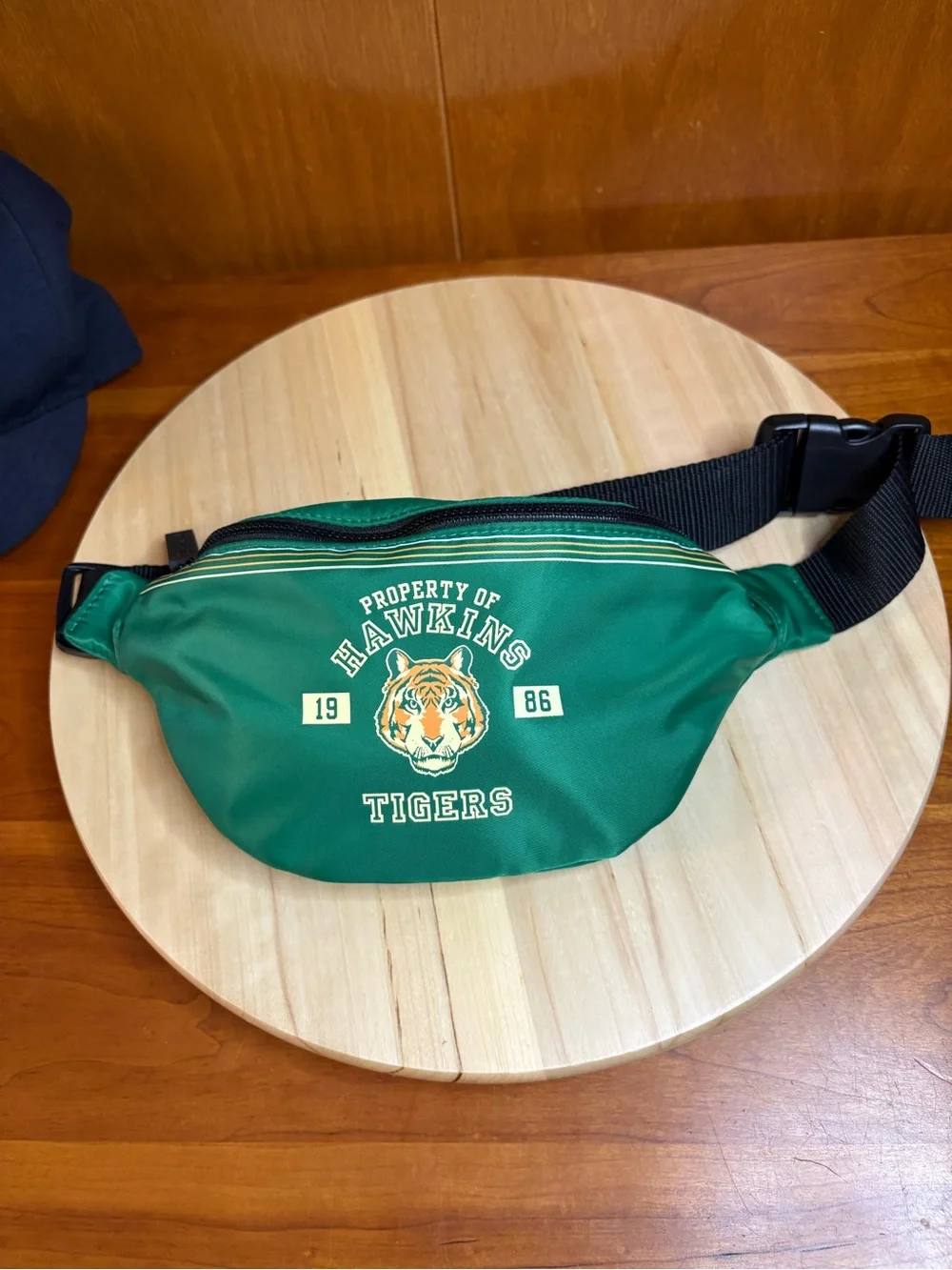 limited-edition MAC Cosmetics x Stranger Things Hawkins Tigers waist bag,